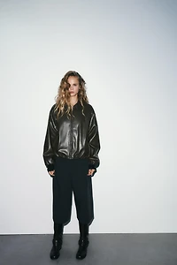 FAUX LEATHER JACKET WITH ELASTICATED DETAILS