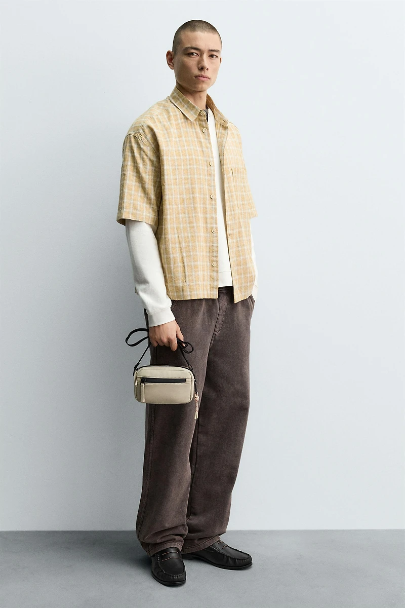 RUBBERIZED CROSSBODY BAG