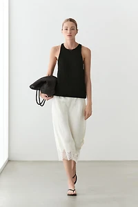 Flowing midi skirt with lace detail