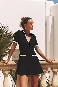 RIBBED DRESS WITH METAL BUTTONS