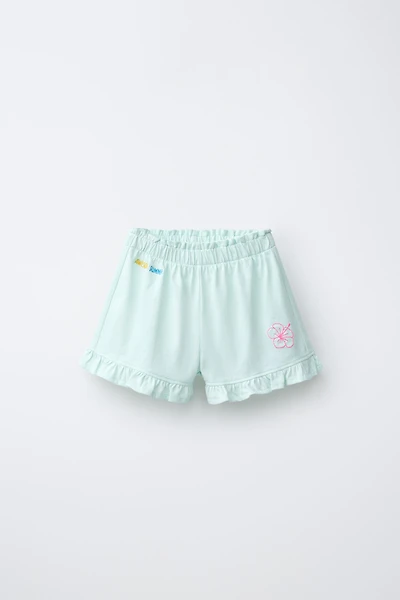 SHORT À VOLANTS IMPRIMÉ TROPICAL