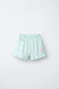 SHORT À VOLANTS IMPRIMÉ TROPICAL