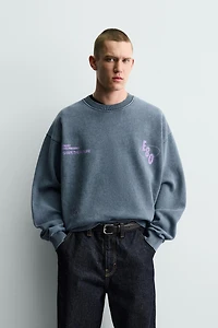 WASHED SWEATSHIRT WITH PRINTED TEXTS
