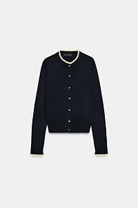 GILET EN MAILLE AVEC FINITIONS DENTELLE