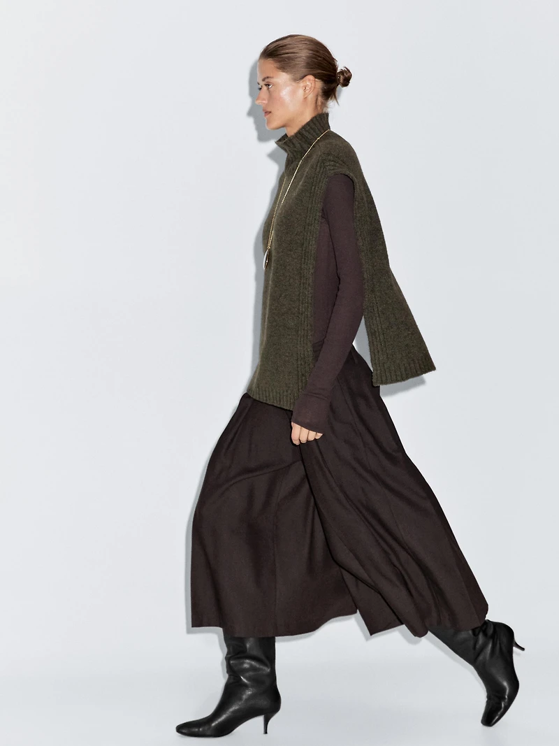 Sleeveless high neck sweater