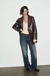 TRF SLUNG LOW-RISE STUDDED JEANS