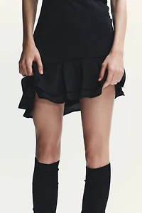 ROBE COURTE ASYMÉTRIQUE HALTER