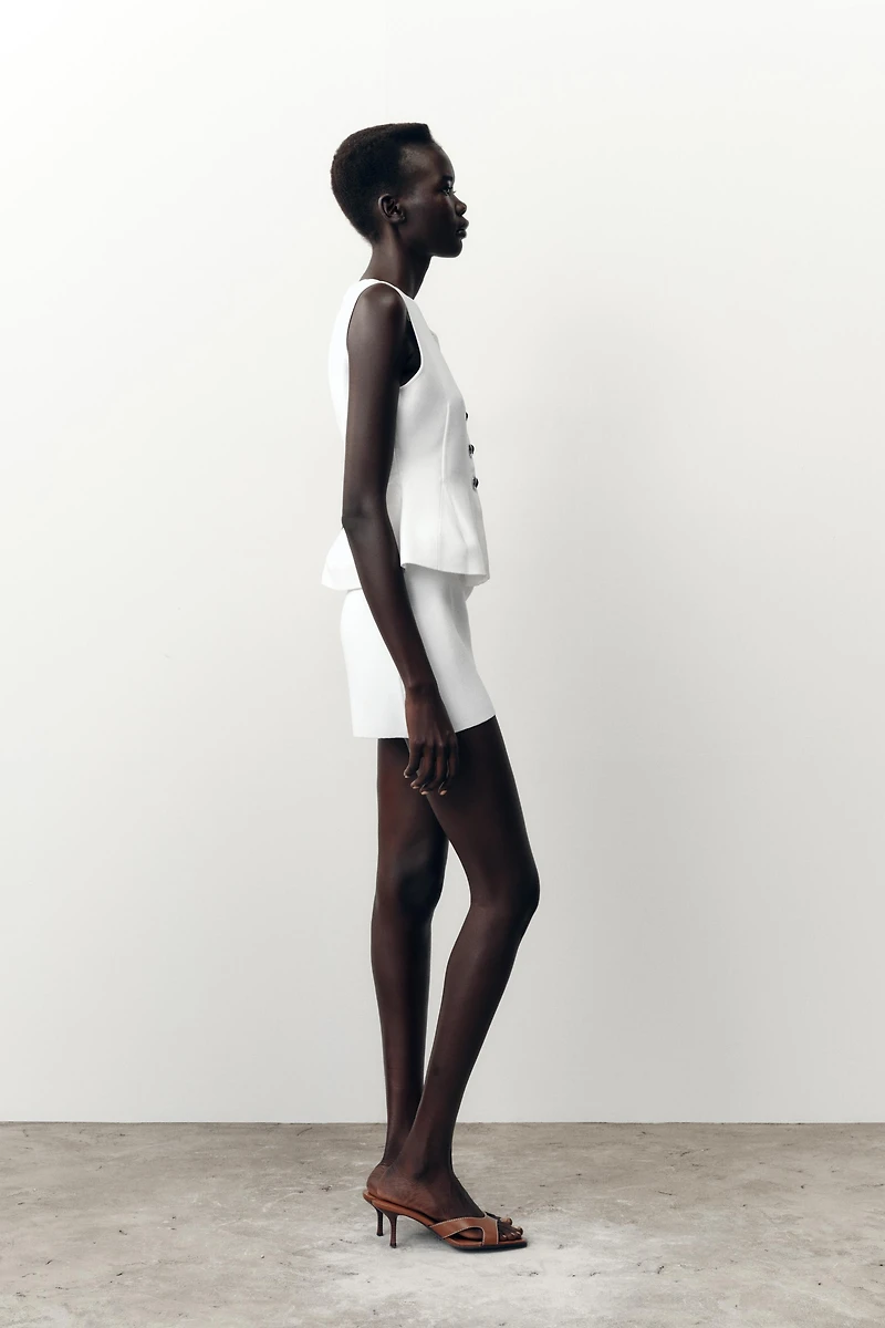 TOP EN MAILLE PÉPLUM