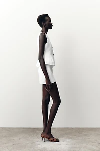 TOP EN MAILLE PÉPLUM