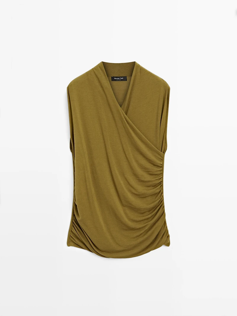 Draped top with surplice neckline