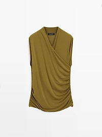 Draped top with surplice neckline
