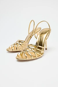 METALLIC EFFECT HEELED SANDALS