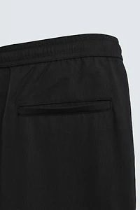 RELAXED FIT FLOWY PANTS