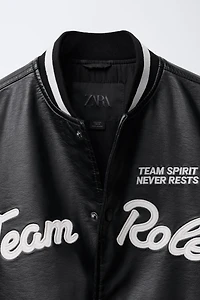 FAUX LEATHER BOMBER JACKET WITH EMBROIDERED TEXT