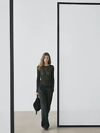 Top en maille de dentelle ajourée à manches longues