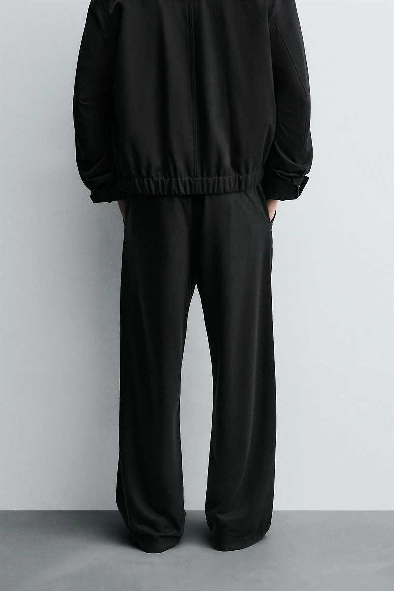 RELAXED FIT FLOWY PANTS
