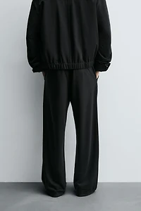 RELAXED FIT FLOWY PANTS