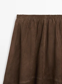 Jupe midi en cuir effet daim