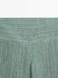 Striped flowing trousers with corset belt detail