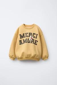 VARSITY TERRY PATCH APPLIQUÉ SWEATSHIRT