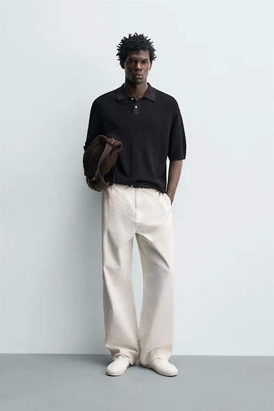 STRUCTURED FLOWY KNIT POLO