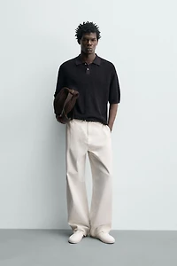 STRUCTURED FLOWY KNIT POLO