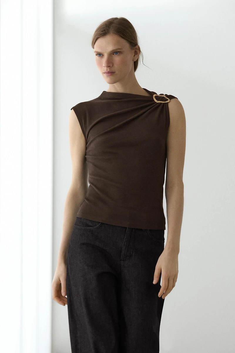 Asymmetric top with rhinestone detail