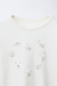 T-SHIRT AVEC APPLIQUÉ FLEURS