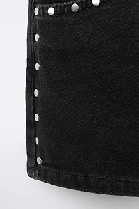JUPE-SHORT EN JEAN À CLOUS
