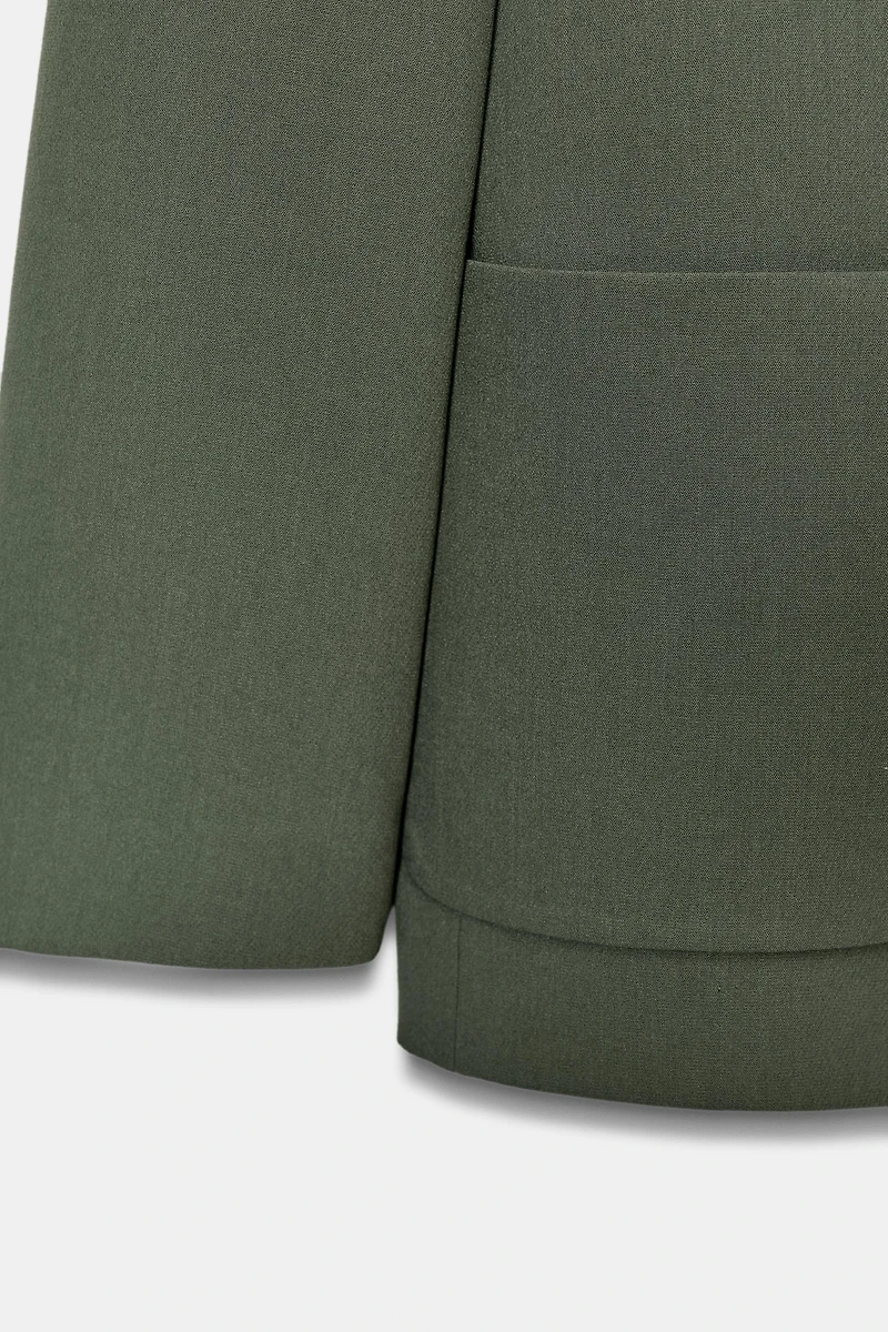 VESTE DROITE À ÉPAULETTES