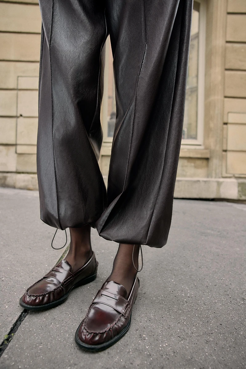 FAUX LEATHER BALLOON PANTS