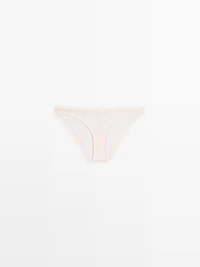 Culotte en dentelle effilochée