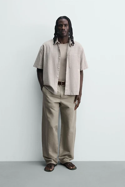RELAXED FIT PLAID TEXT SHIRT