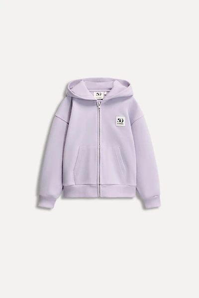 6 YEARS/ 50TH ANNIVERSARY LABEL ZIP-UP SWEATSHIRT