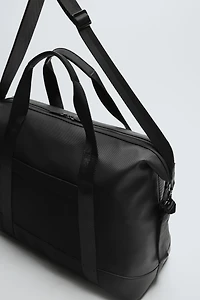 SAC DE VOYAGE GOMMÉ