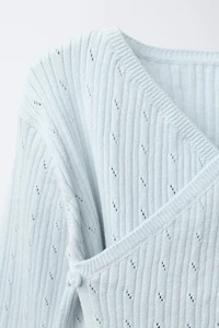 PULL EN MAILLE CÔTELÉ AJOURÉ