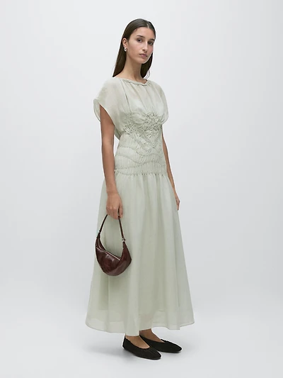 Long flowing dress with embroidered details