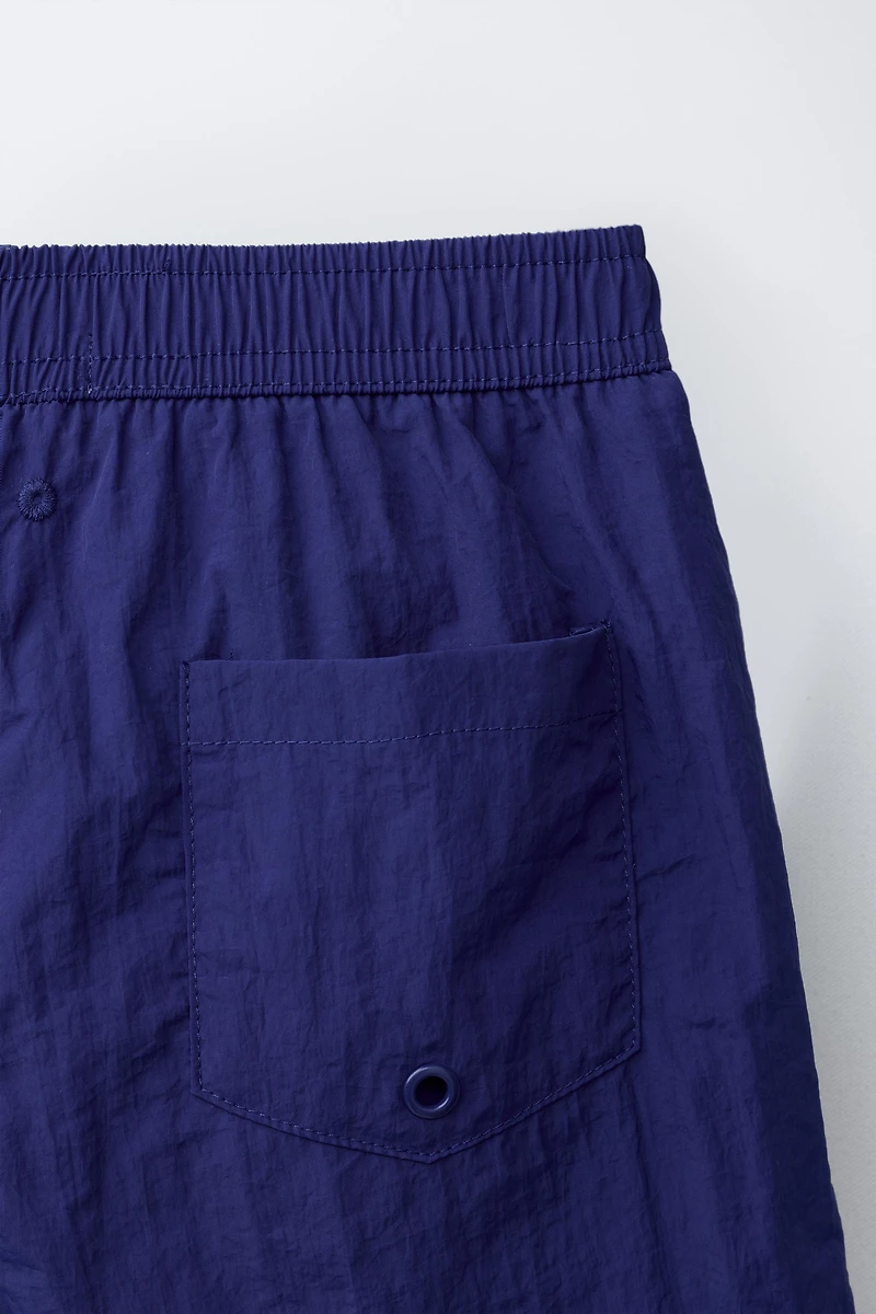 AGES 6-14 / SWIM SHORTS WITH STOPPER