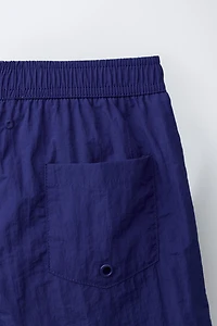 AGES 6-14 / SWIM SHORTS WITH STOPPER
