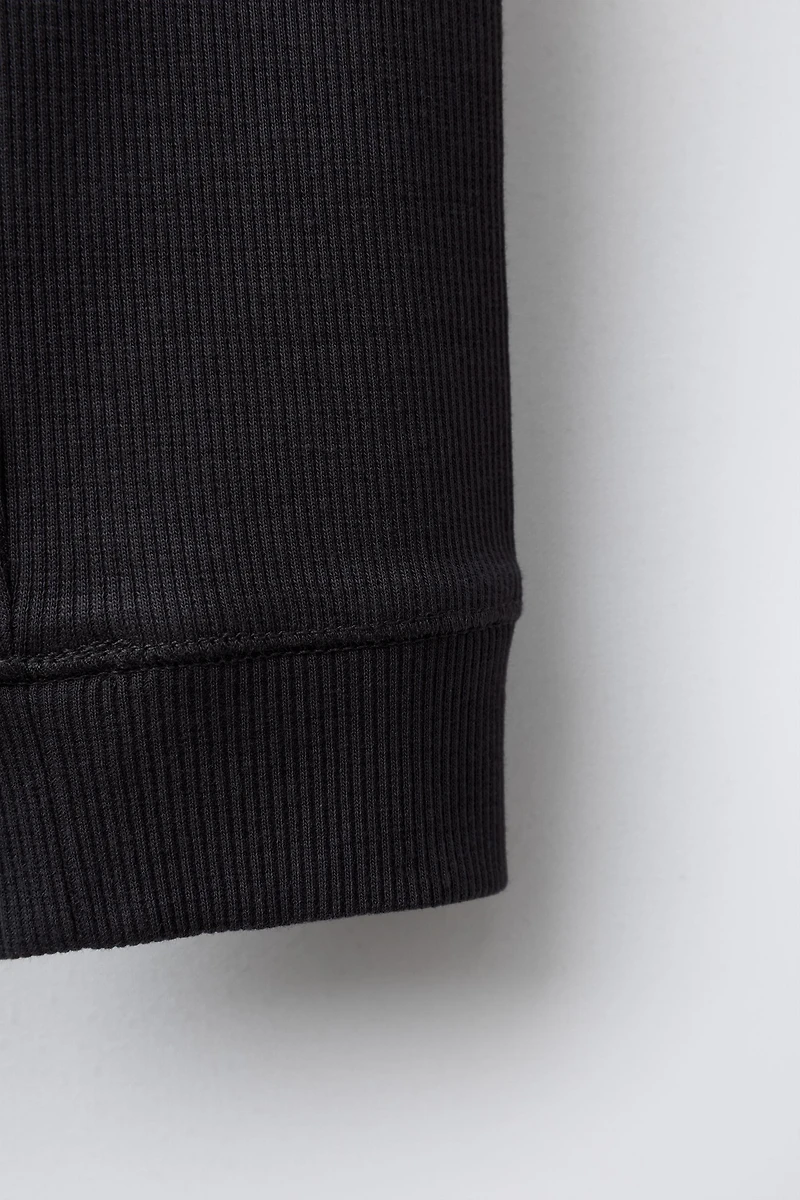 RIBBED LEGGINGS WITH BUTTONS