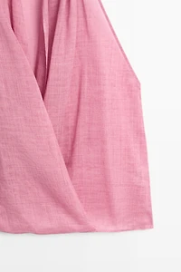 Draped crossover top