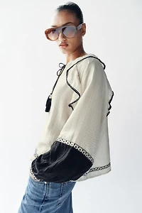 VOLUMINOUS RUFFLE BLOUSE