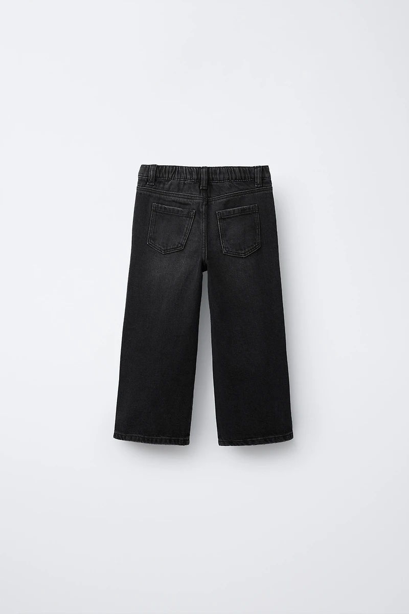 CROSSOVER WAIST WIDE LEG JEANS