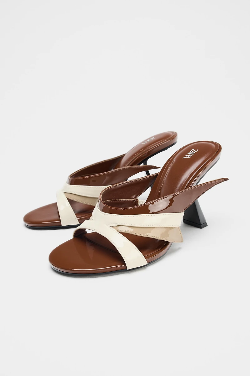 ASYMMETRIC HEELED SANDALS