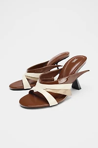 ASYMMETRIC HEELED SANDALS