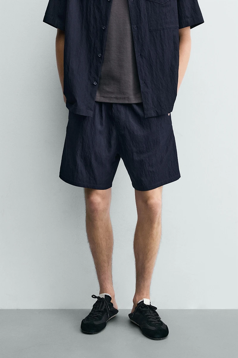 RELAXED FIT FLOWY SHORTS
