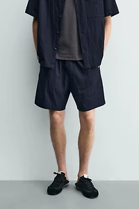 RELAXED FIT FLOWY SHORTS