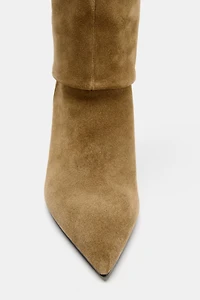 BOTTES À TALONS EN CROÛTE DE CUIR