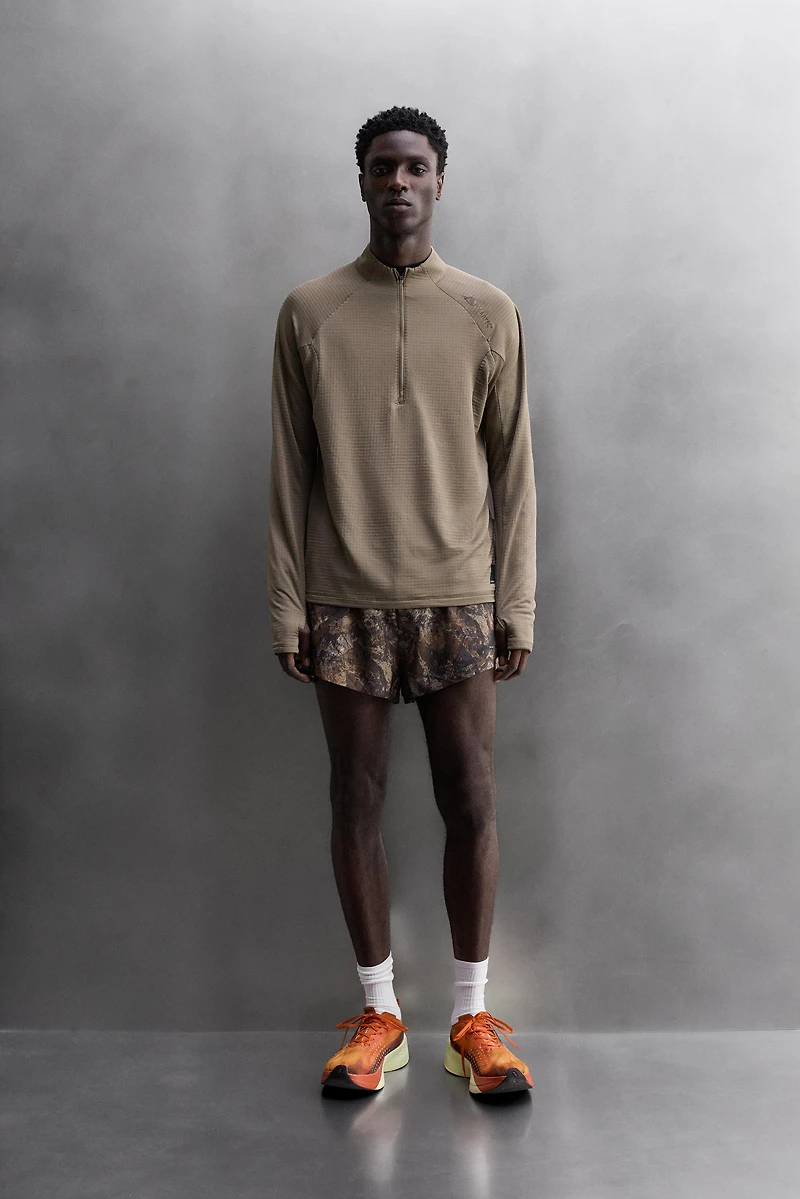 TREE PRINT RUNNING SHORTS