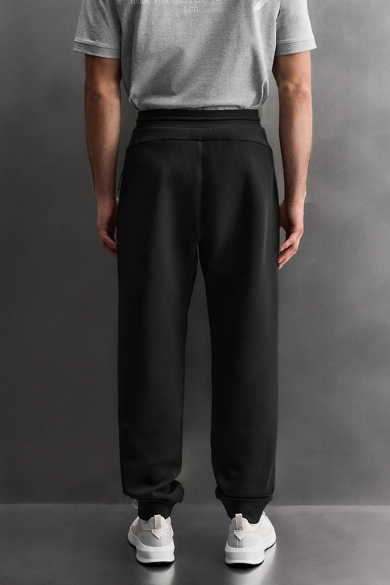 TECHNICAL PANTS WITH ZIPPERS